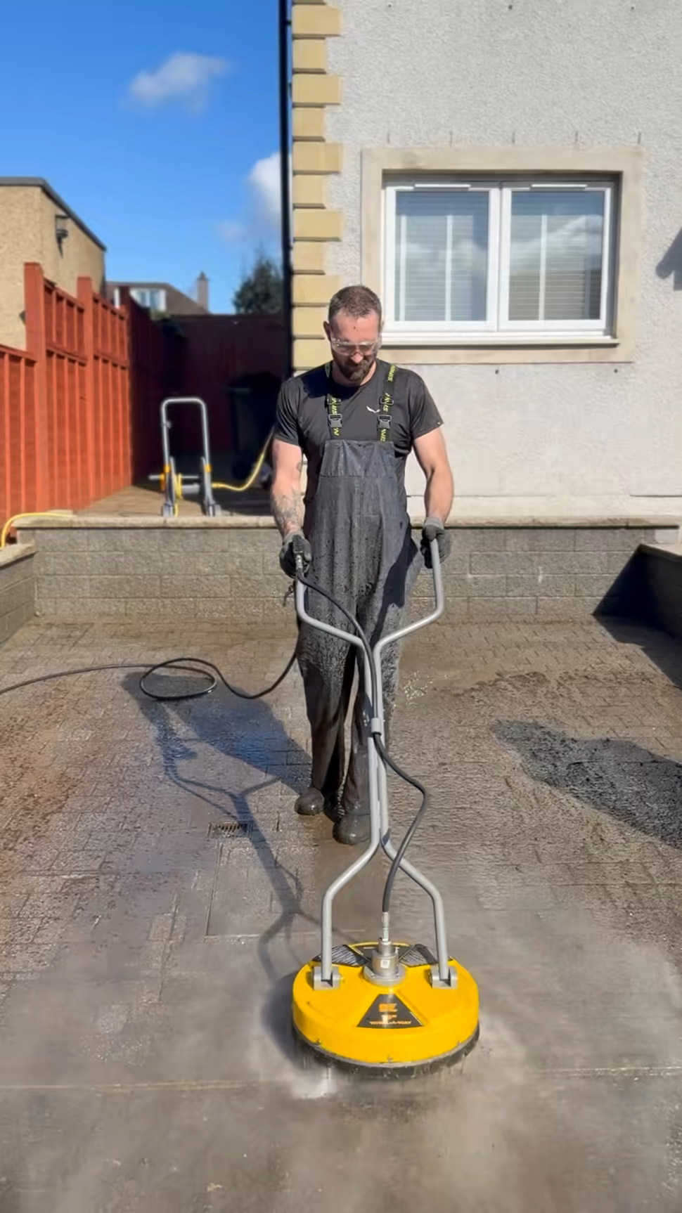 Surface cleaner pressure washing a driveway in Edinburgh